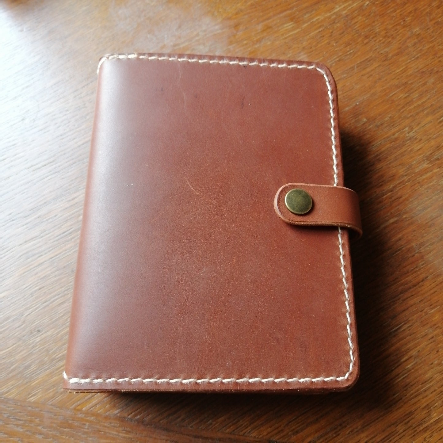 Handbunden A6 journal i läder